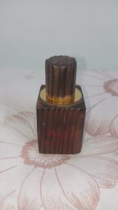 Nature's Touch: Wood-Carved Attar Bottles